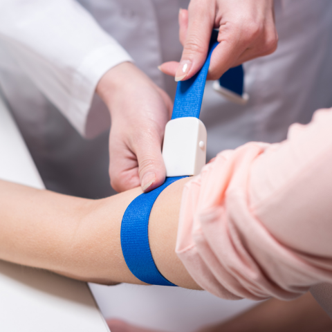 cropped shot of doctor preparing patient to do a blood test